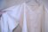 画像13: オフホワイト花刺繍タッセルリボン付きスリットネックボリュームスリーブ長袖トップ (13)