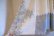 画像12: 70年代ホワイト×くすみブルー×ライトブラウン花＆レース柄ウエストリボン付きVネックフレアスリーブ半袖ロングドレス