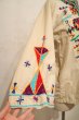 画像13: ホワイトベージュ×カラフルエスニック刺繍ポケット付きクルーネックフレアスリーブ七分袖チュニック (13)